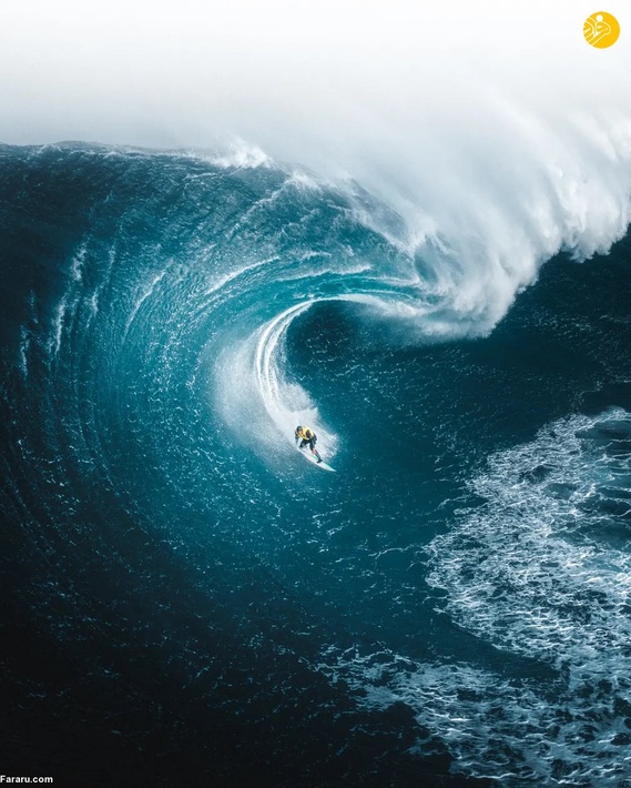     موج سوار کریس راس از یک موج عظیم در استرالیا فرود می آید / فیل د گلانوئل

